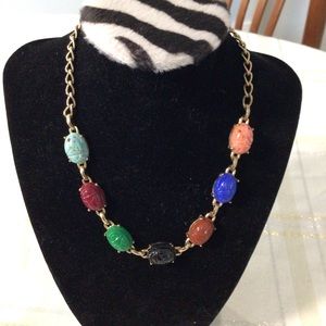 Vintage necklace 7 different color stones with adjustable length.